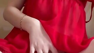 A Slut in a Red Negligee Got Turned on by Watching a Movie and Plays with Tits & Butt Plug