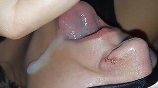 The young whore swallows the sperm directly from the condom after passionate sex with the gifted boy