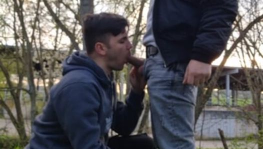 Two hot boys with big dicks smoking, wanking and sucking outdoors