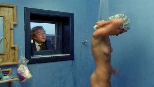 Dalila Di Lazzaro topless in a movie