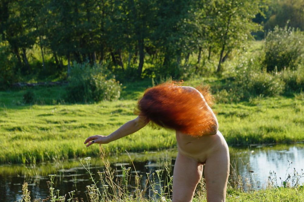 Flame Hair naked upon river #23