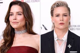 Sophia Bush in a strapless gown and Katherine Moennig in a suit, attending an event