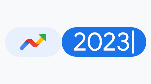 Google Trends-Logo neben einer Suchleiste mit dem Text „2023“ und einem Cursor am Ende