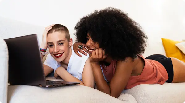 Two women looking at a screen