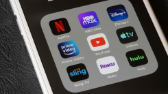 A phone with a grid of entertainment apps, like Netflix and Prime Video