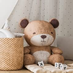 Kinderzimmer mit Krippe und Teddybär