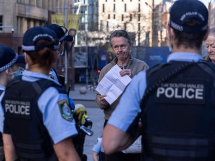 SYDNEY, AUSTRALIA - AUGUST 31: Police speak to a small group of protestors outside the Par