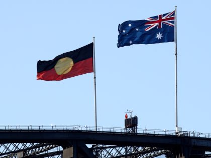 SYDNEY, AUSTRALIA - JANUARY 26: The Aboriginal flag flies alongside the Australian flag on