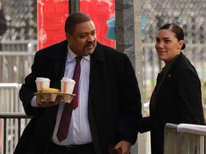 Manhattan District Attorney Alvin Bragg (L) arrives at Manhattan Criminal Court for the se