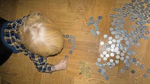 Wie Eltern ihren Kindern den richtigen Umgang mit Geld beibringen
