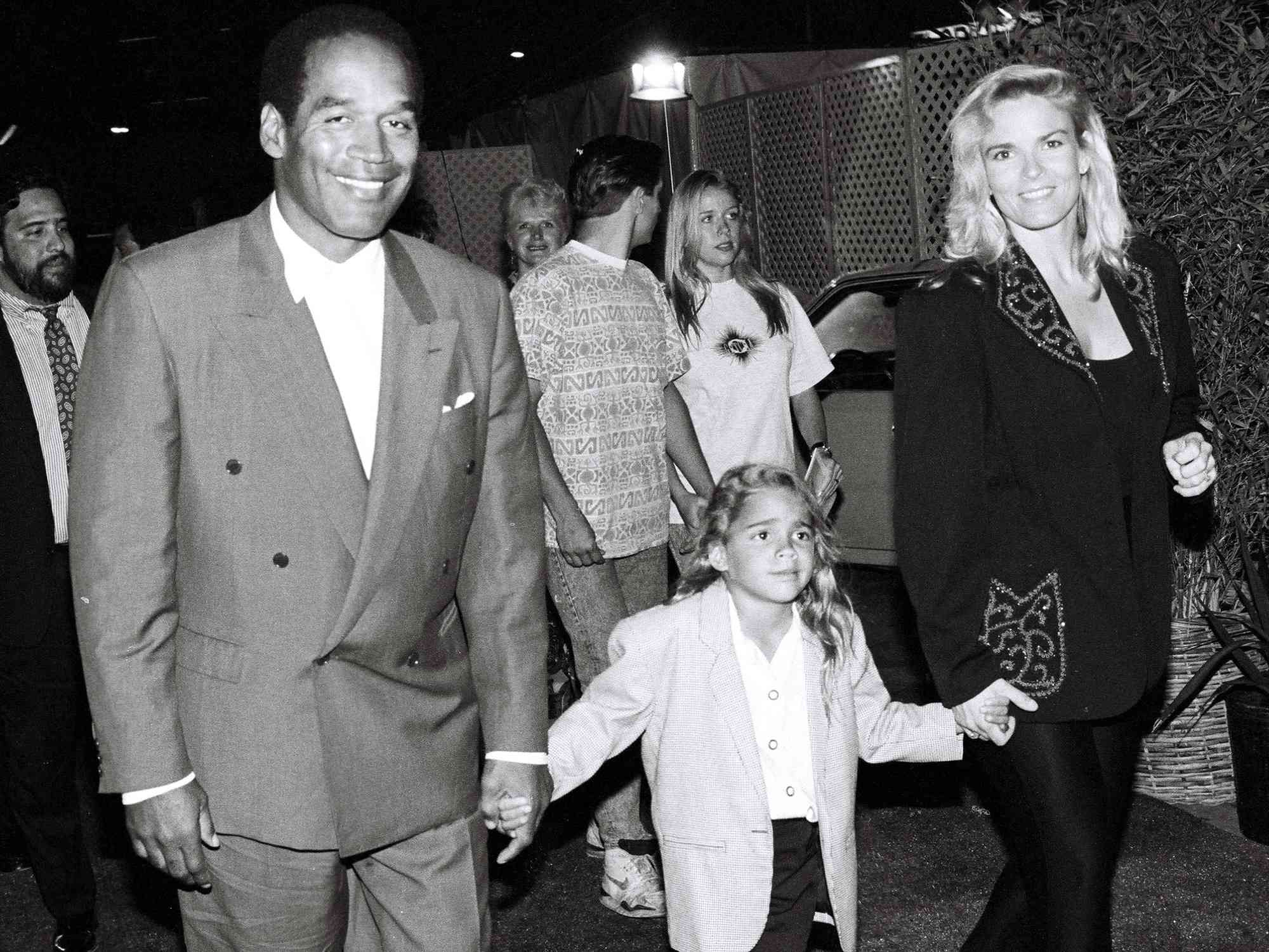 OJ Simpson, Nicole Simpson and daughter Sydney Simpson at the 'Naked Gun 2 1/2' Premiere on June 27, 1991.