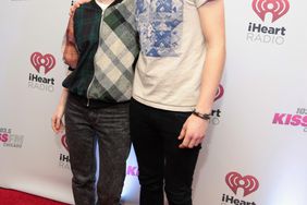 Hayley Williams and Taylor York of Paramore pose backstage at 103.5 KISS FMs Jingle Ball 2013