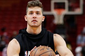 Miami Heat center Meyers Leonard warms up before the start of an NBA basketball game, Wednesday, March 4, 2020, in Miami.