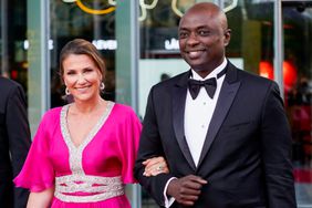 his picture taken on June 16, 2022 shows Norway's Princess Martha Louise (L) and her American fiance Durek Verrett 