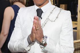 BEVERLY HILLS, CA - JANUARY 08: 74th ANNUAL GOLDEN GLOBE AWARDS -- Pictured: Pharrell Williams arrives to the 74th Annual Golden Globe Awards held at the Beverly Hilton Hotel on January 8, 2017. (Photo by Neilson Barnard/NBCUniversal/NBCU Photo Bank via Getty Images)