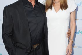Actor Sylvester Stallone and wife Jennifer Flavin arrive at Goldie Hawn And Kurt Russell Host Annual Goldie's Love In For Kids at Ron Burkle's Green Acres Estate on May 6, 2016 in Beverly Hills, California