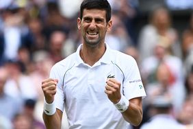 Serbia's Novak Djokovic celebrates winning against Italy's Matteo Berrettini during their men's singles final match on the thirteenth day of the 2021 Wimbledon Championships at The All England Tennis Club in Wimbledon, southwest London, on July 11, 2021.