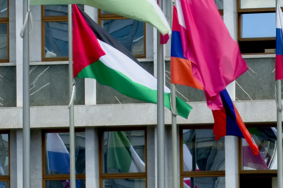 A Palestinian flag flying next to other flags at the Slovenian Parliament Building. Photo: Živa Ogrin/STA